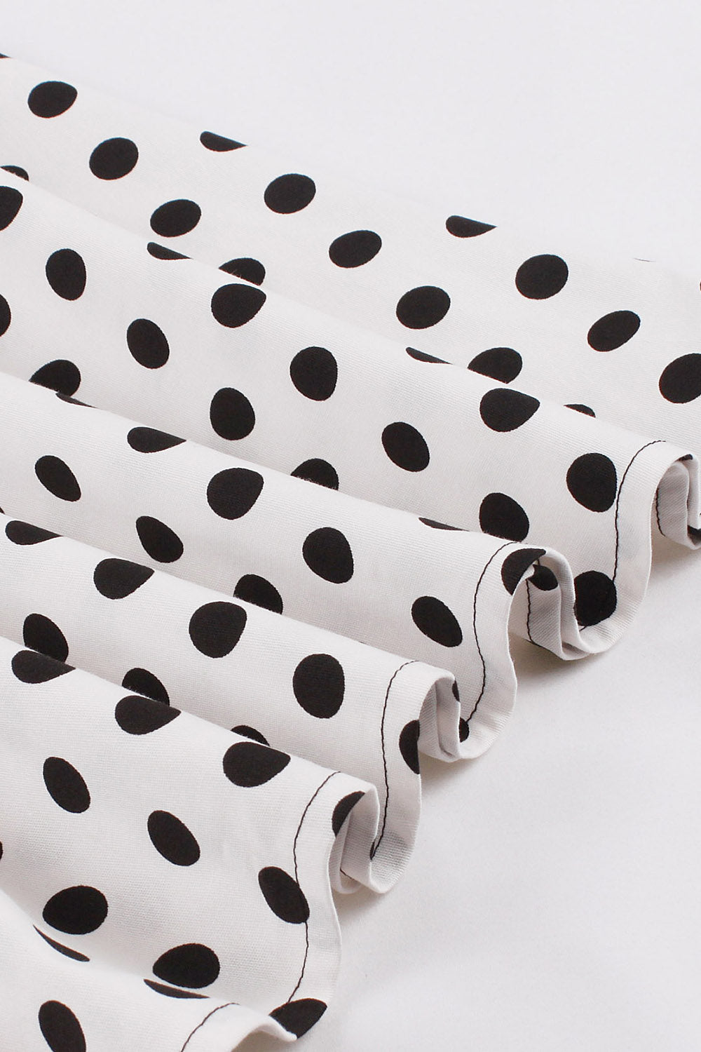 Robe noire à pois style années 50, A-ligne, manches courtes et ceinture